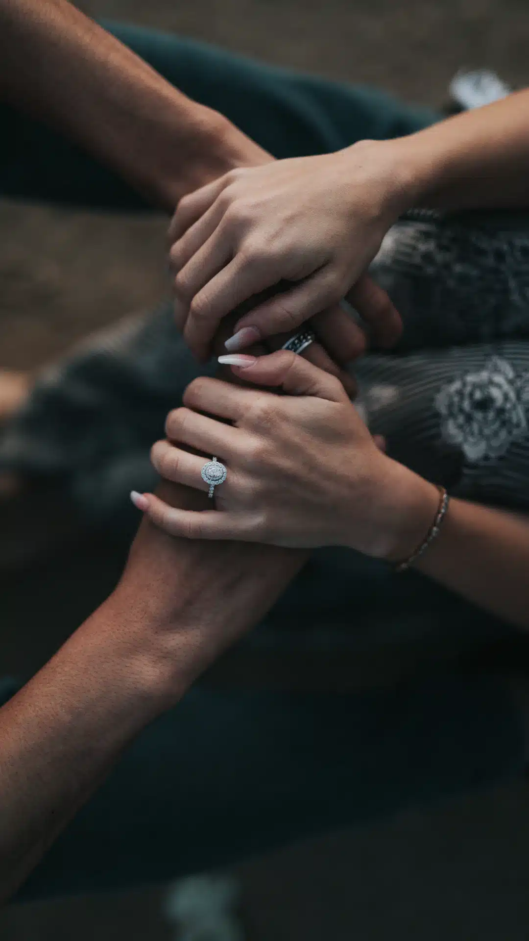man and woman holding each others hands